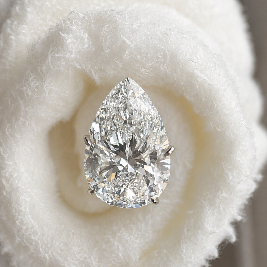 Pear-shaped lab-grown diamond in wrapped cream texture