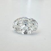 7.03 Carat Oval Brilliant Lab-Grown Diamond on White Surface