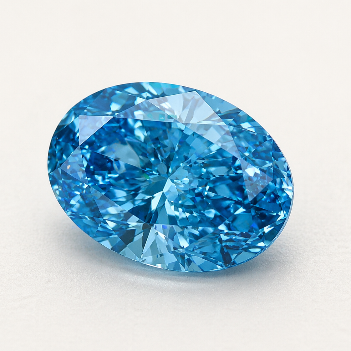 Blue diamond on soft light ivory background