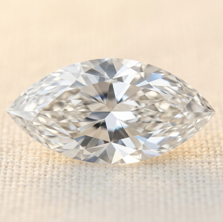Marquise-shaped diamond on a beige background