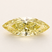 Yellow diamond on a light beige background