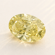Yellow diamond on a light beige background